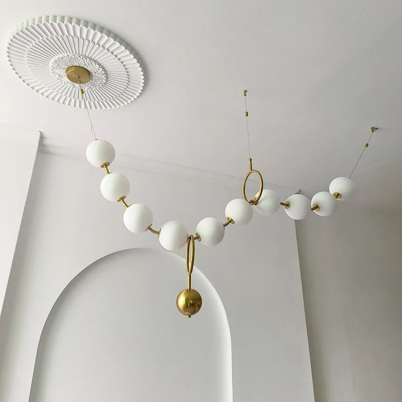 Modern creative staircase long pendant light Nordic light luxury restaurant clothing store showcase bar counter round light