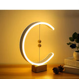 Nordic magnetic levitation balance lamp magnetic table lamp bedroom bedside home decoration desk lamp Beech wood lamp holder