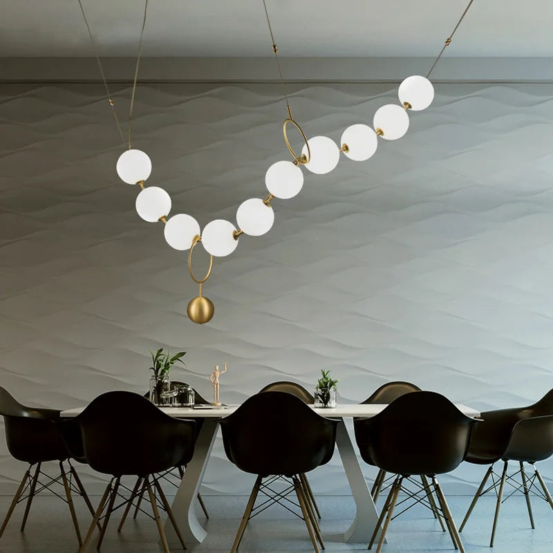 Modern creative staircase long pendant light Nordic light luxury restaurant clothing store showcase bar counter round light