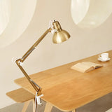 Electric 62000010 32 MultiJoint Desk Lamp with Metal Clamp, Matte Brass, White Accents, On Off Rotary Switch on Shade, Partially